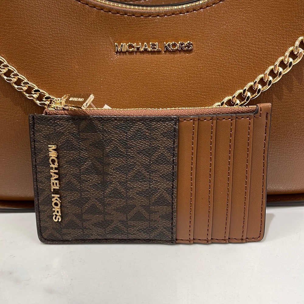 Michael Kors Jet Set Travel Medium Top Zip Card Case Wallet
PVC Leathr
Brown
NWT - Picture 12 of 16